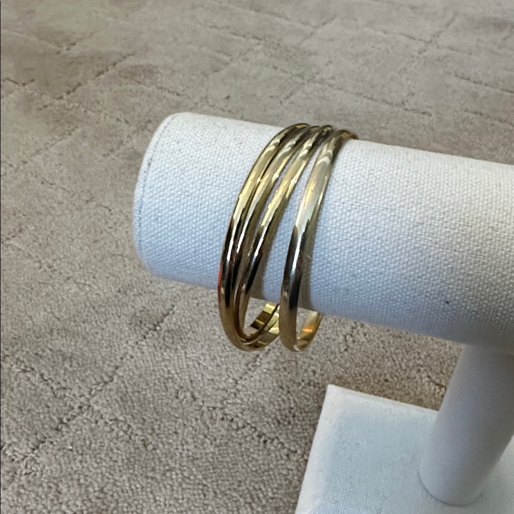 4 Gold Bangle Bracelet 3 of them are attached